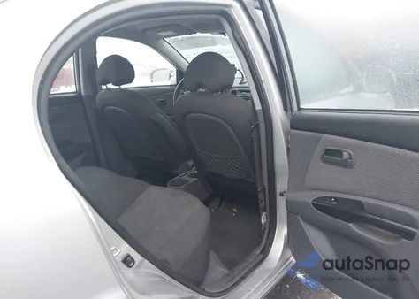 2011 Kia Rio Lx z USA, uszkodzony, nr VIN KNADH4A39B6925111